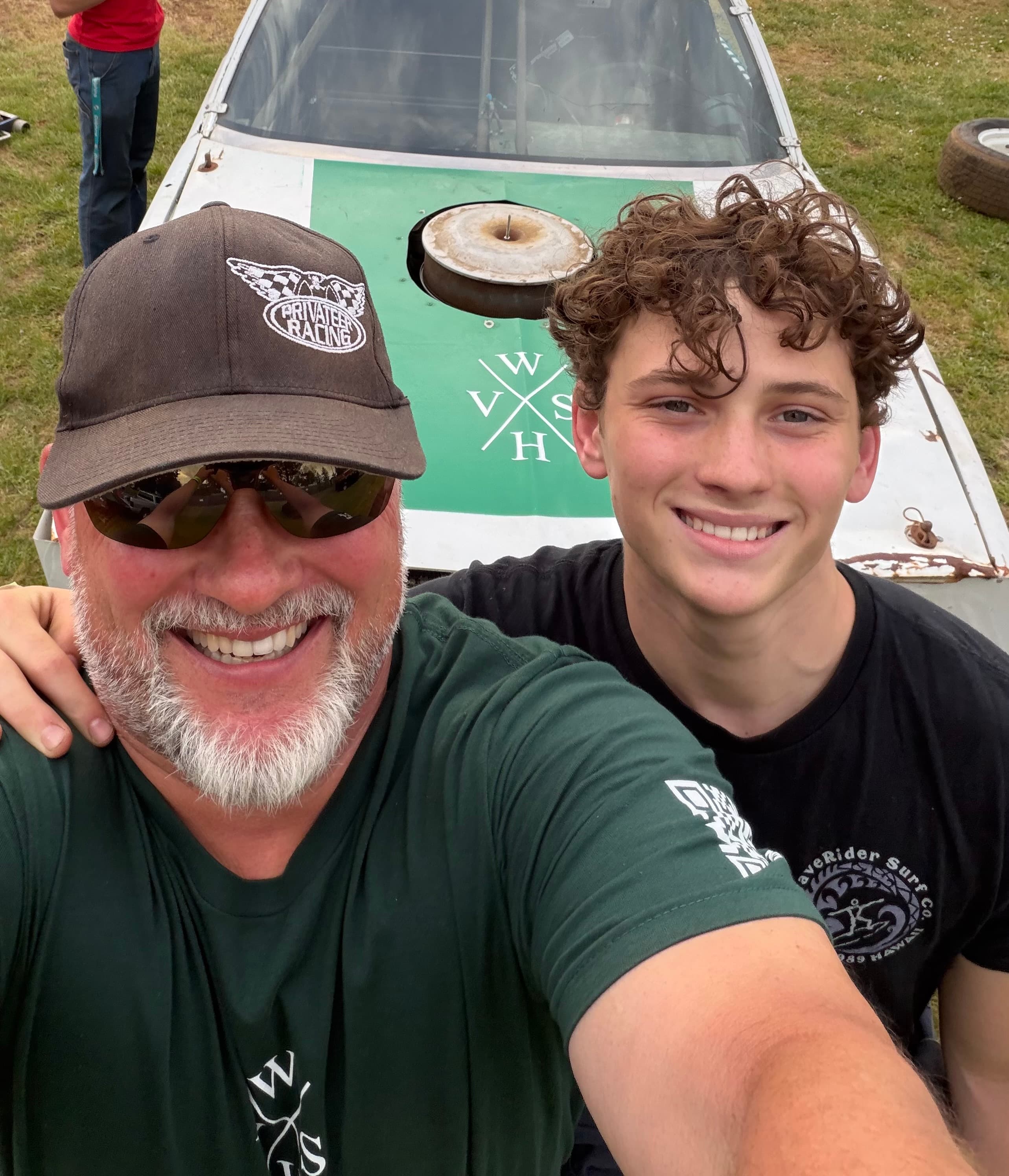 Robert Ireland and his son with their stock car